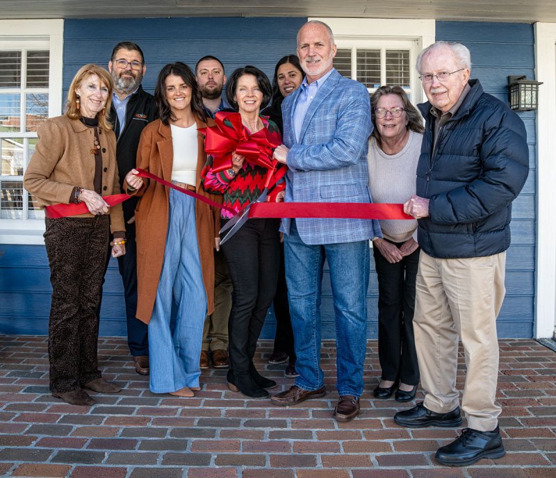 Ribbon-cutting attendees shown are in back (l-r) Lou Savino, Thomas Bowers and Joanie Castagno. In front are Betsy Reamer, Lewes chamber; Kristin Scholl; Megan Duffy; Doug Salter; Monica Gallagher; and Joe Stewart, Lewes chamber member. SUBMITTED PHOTO